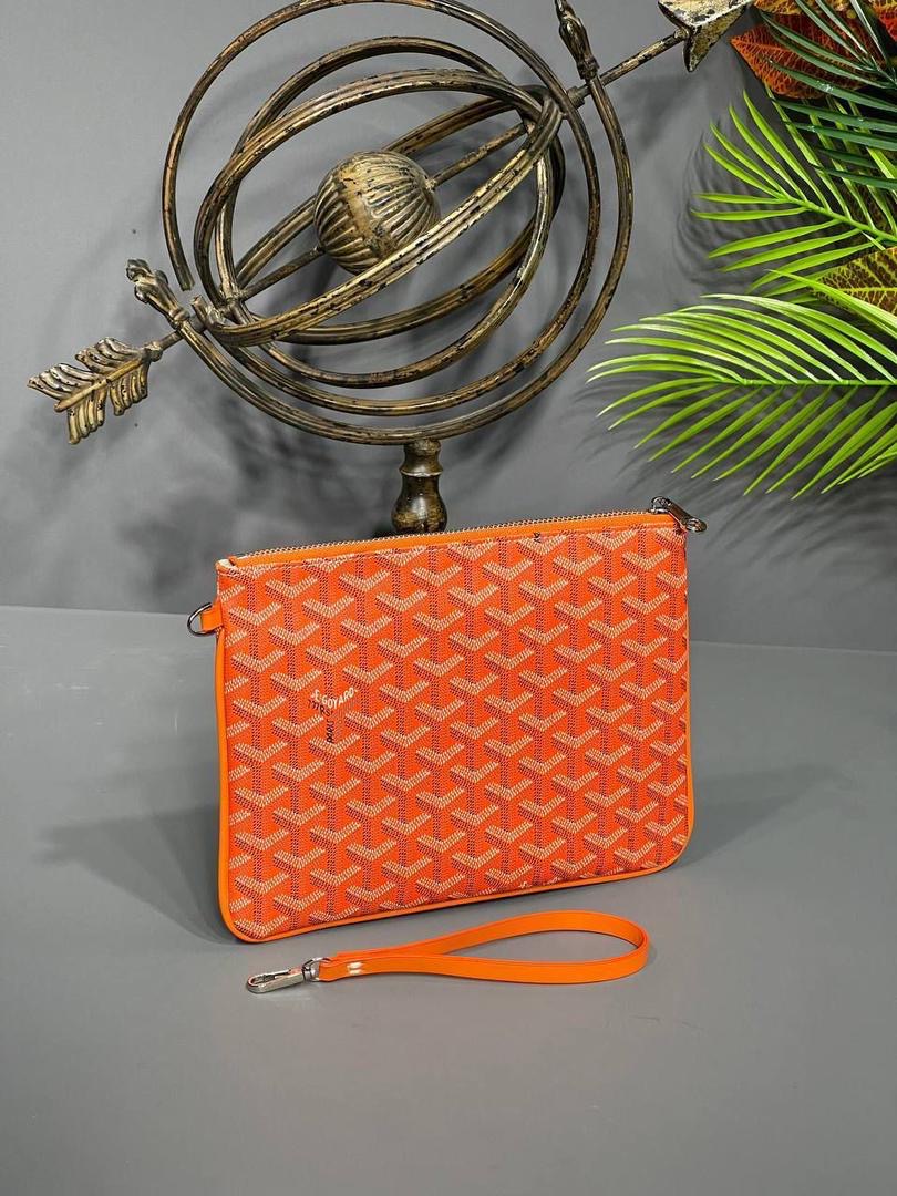 Monogram Zippered Clutch